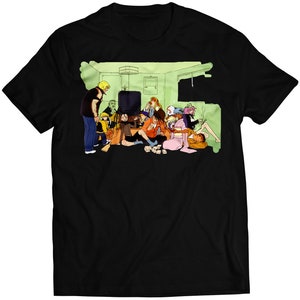 May include: A black t-shirt with a colorful illustration of a group of people sitting in a room. The illustration features a variety of characters, including a man with a blonde afro, a woman with long black hair, and a man with a red bandana. The characters are all wearing different clothes and are sitting in a variety of poses.