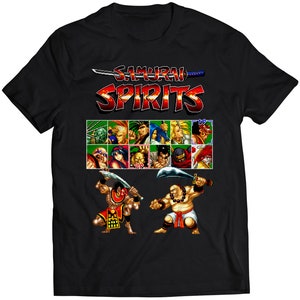 May include: Black t-shirt with a pixelated graphic of the video game Samurai Spirits. The graphic features the game's title, a sword, and characters from the game.