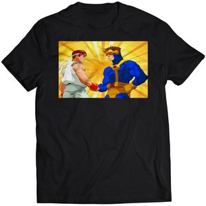 May include: A black t-shirt with a graphic print of two characters from a video game. The characters are facing each other and appear to be shaking hands. The background is yellow with a radial pattern.