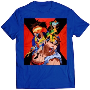 May include: A blue t-shirt with a graphic print of three characters from a video game. The characters are in a fighting pose and have a red and yellow background.