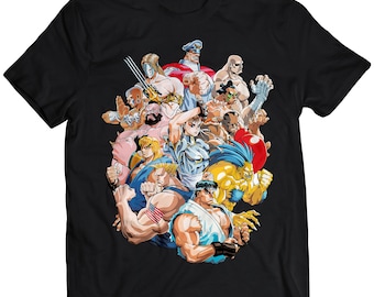 May include: A black t-shirt featuring a colourful graphic print of a group of characters from a video game. The characters are all in fighting poses and have different coloured clothing and hair.