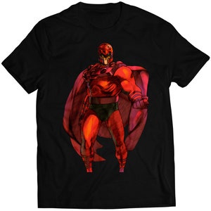 Peut inclure: T-shirt noir avec une illustration rouge et blanche de Magneto, un super-héros de Marvel Comics. Il porte un costume rouge et noir avec une cape et un casque.