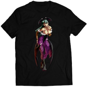 May include: Black t-shirt with a colorful illustration of a female character with green hair and purple clothing. The character has wings and is wearing a costume with a plunging neckline.