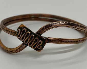 Vintage bangle bracelet in bronze