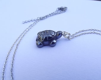 Small natural hematite pendant necklace: carved turtle.TIA-125