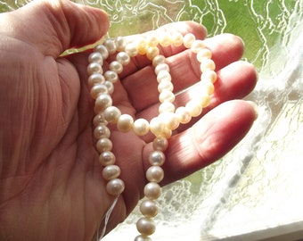 56+ irregular white freshwater (mother of pearl) pearls 7-8 mm TIA-71