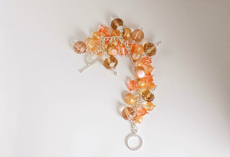 Peaches and Cream Peach and Silver Charm Bracelet