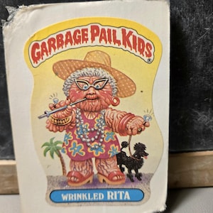 vintage 1980s original Sticker Card Garbage Pail Kids 80s Wrinkled Rita, funny decal for laptop tablet, retro Topps parady cabbage patch