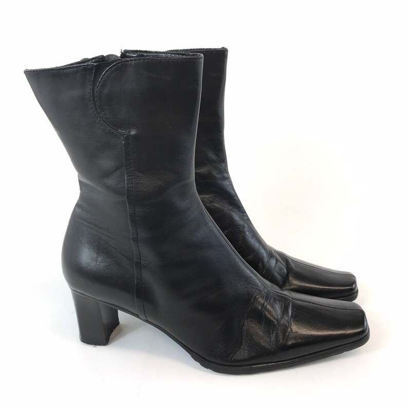 zip up heeled boots