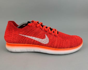 Scarpe da ginnastica Nike da uomo, taglia UK 9.5, Free RN Flyknit, ideali per corsa e palestra.