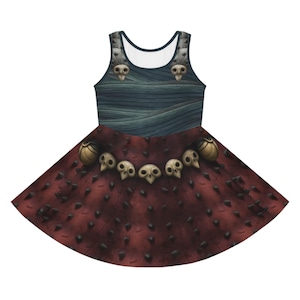 May include: A sleeveless skater dress with a distinctive design. The bodice has a dark blue, textured pattern, and the skirt is deep red with a pattern of small, dark spikes. The dress is decorated with skull and bone details.