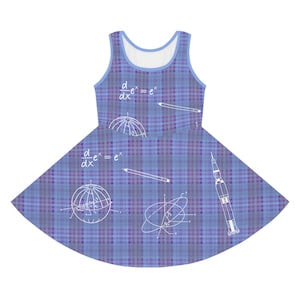 May include: A sleeveless dress in a blue and purple plaid design. The dress is decorated with white illustrations of mathematical equations, geometric shapes, and a rocket. The neckline and armholes are light blue.
