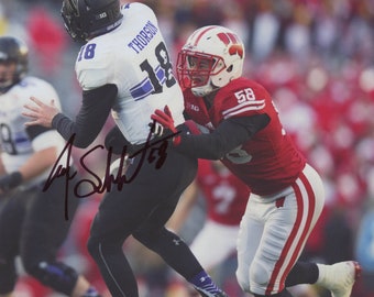 Joe Schobert Autographed 8x10 Photo- Wisconsin Badgers - Jacksonville Jaguars - Certificado por JSA COA
