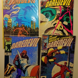 Lot de bandes dessinées Daredevil : n° 227, n° 228, n° 229, n° 238 - Première apparition des dents de sabre !