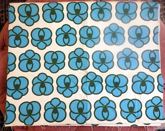 Tela vintage estilo mod con estampado floral, lona azul y blanca, estilo retro de los años 60.
