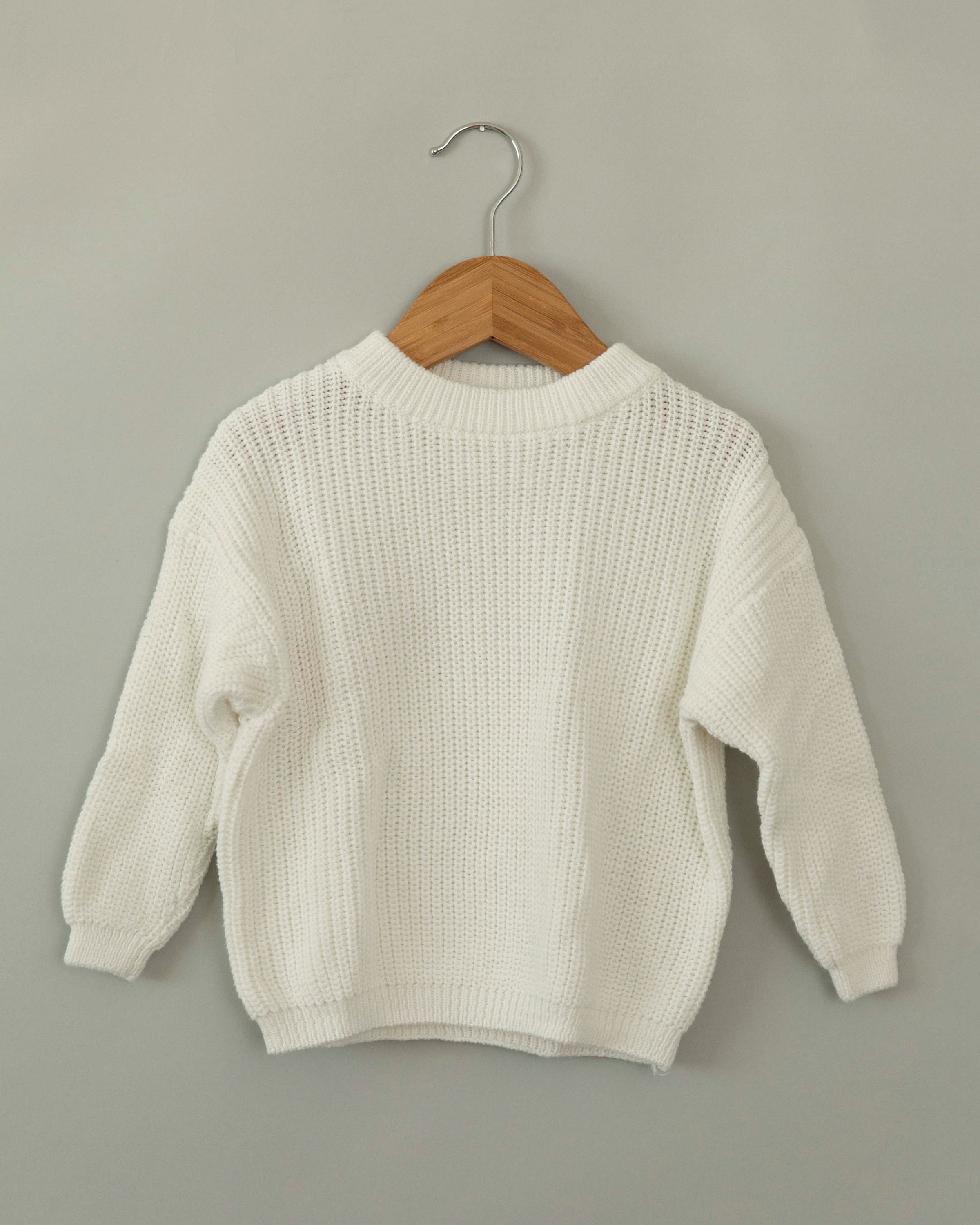 white sweater baby girl