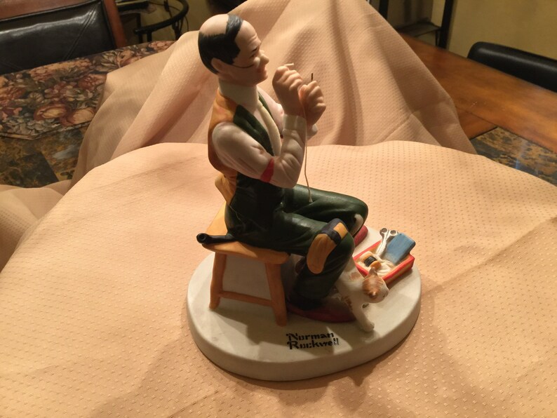 Norman Rockwell Porcelain Figurine Man Threading Needle.