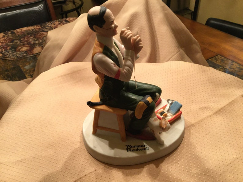 Norman Rockwell Porcelain Figurine Man Threading Needle.