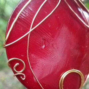 Elegante wirewrapped Ruby Disc