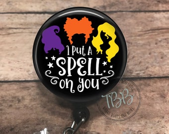 Spell - retractable badge reel - badge clip - lanyard - stethoscope ID tag - badge holder