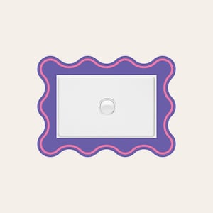 May include: A white light switch with a round button set within a purple frame with a wavy pink border. The design is simple and modern, suitable for home decor.