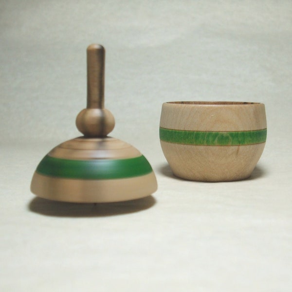 Small wooden jewelry box with spinning top cover made with a manual wood lathe, manual woodturning