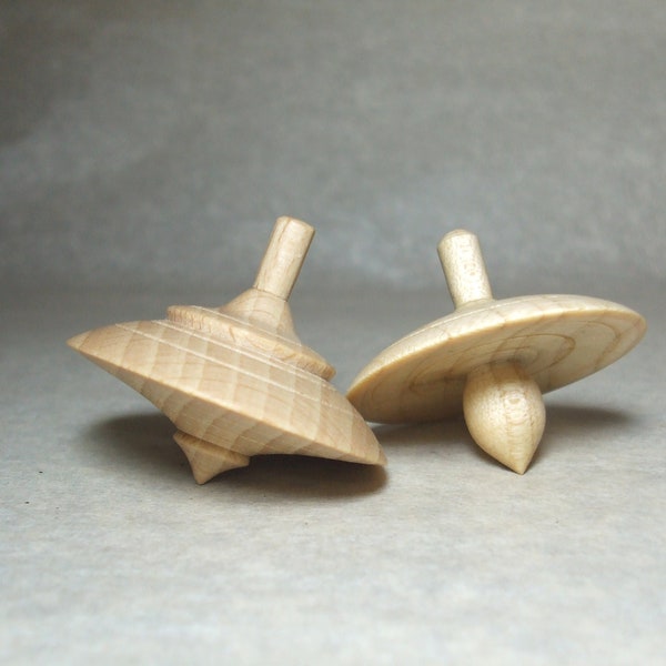 Set of two spinning tops, maple and beech wood, manual woodturning