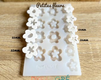 Moldes de silicona con forma de borla floral para crear joyas u otros artículos utilizando polímero, resina epoxi y luz UV. Acabado brillante.