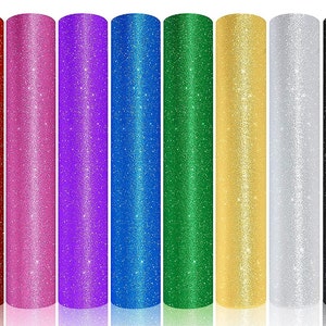 May include: Ten rolls of glitter iron-on vinyl in various colors, including red, pink, purple, blue, green, gold, silver, and black.