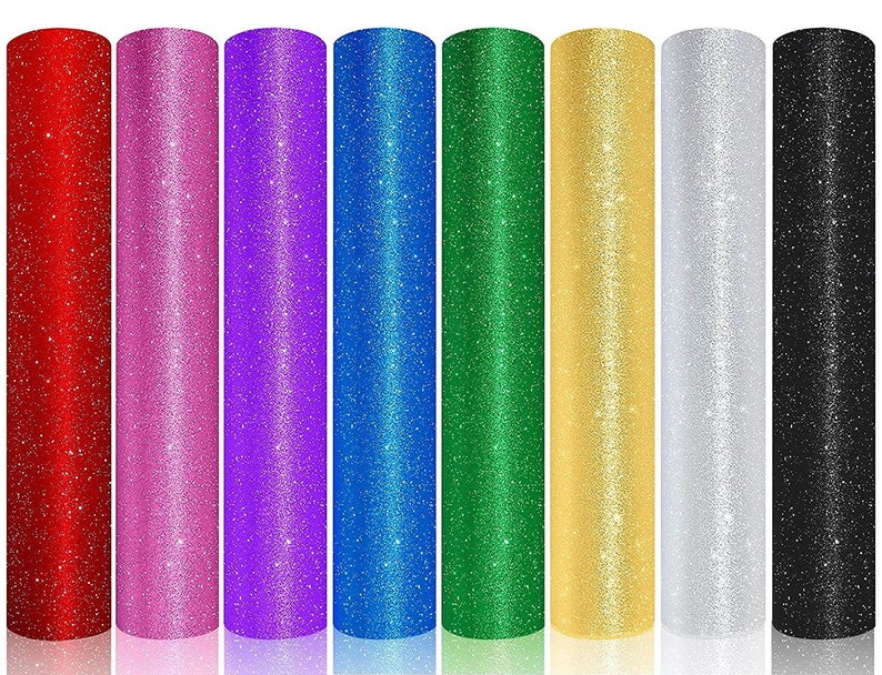 May include: Ten rolls of glitter iron-on vinyl in various colors, including red, pink, purple, blue, green, gold, silver, and black.