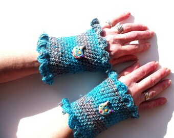 Crocheted cuff mittens in turquoise and gray wool.
