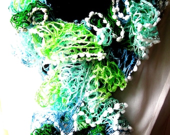 Crocheted scarf handmade in green, white and blue tones it measures about