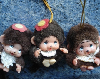 Set of three vintage kikis monkey plush toys