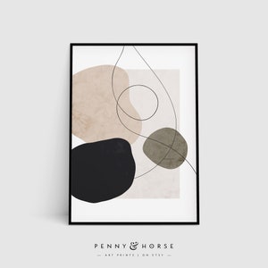 May include: Framed abstract art print. The artwork displays organic shapes in beige, black, and olive green, with a fine black line drawing. The text "PENNY & HORSE" is at the bottom of the print.
