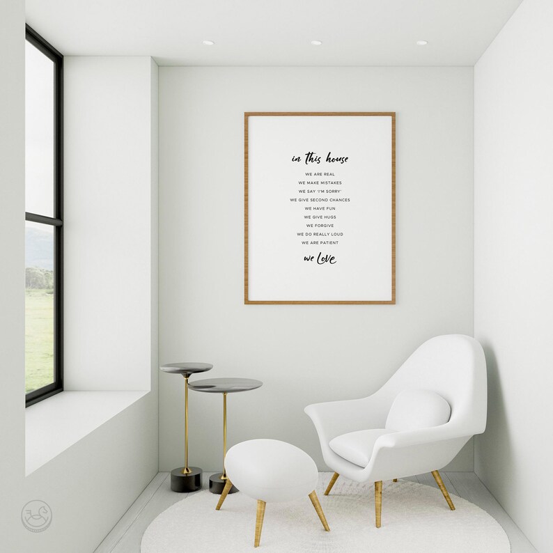 May include: A framed print with the text "in this house we are real we make mistakes we say 'I'm sorry' we give second chances we have fun we give hugs we forgive we do really loud we are patient we love"