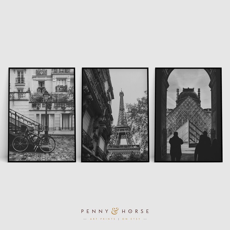 May include: A set of three black and white photographs of Paris, France. The first photo shows a Parisian street with a bicycle parked on the sidewalk. The second photo shows the Eiffel Tower from a street level perspective. The third photo shows a view of the Louvre Museum from inside the building.