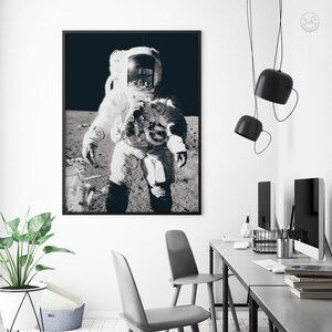 May include: Black and white photograph of an astronaut walking on the moon. The astronaut is wearing a spacesuit and helmet. The surface of the moon is visible in the background.