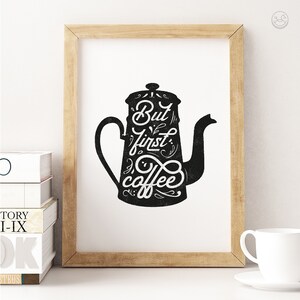 May include: A black and white printable wall art design featuring a coffee pot silhouette with the text "But first, coffee" in a stylized font.