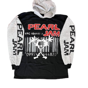 May include: A black long-sleeve hoodie with light gray sleeves and a matching hood. The front features the red text PEARL JAM above a white graphic of a stick figure over a barcode, with the text EPC 484448 2 and 099748 444820. PEARL JAM is printed in black on both sleeves.