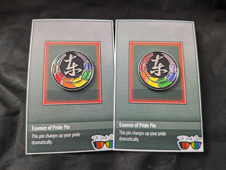 Toji Clan inspired pride enamel pins on an essence of pride NerdyQueer backing card.