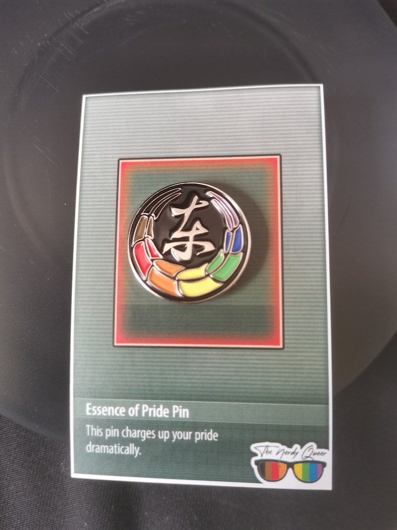 Toji Clan inspired pride enamel pins on an essence of pride NerdyQueer backing card.