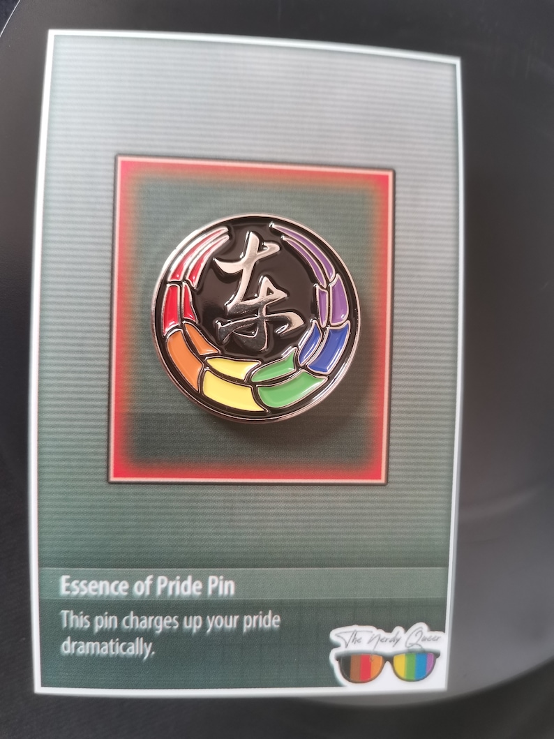 Toji Clan inspired pride enamel pins on an essence of pride NerdyQueer backing card.