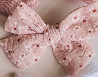 Fabric bow clip with cute floral detailing