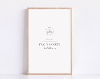 May include: A light wood frame mockup with the text "FRAME MOCKUP" and "files Psd Png Jpg" in a light gray font. The text "The Floor Studio" is in a circle with a light gray outline.
