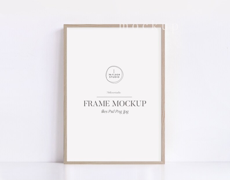 May include: A light wood frame mockup with the text "FRAME MOCKUP" and "files: Psd Png Jpg" in the center of the frame. The text "The Floor Studio" is in a circle in the upper left corner of the frame.