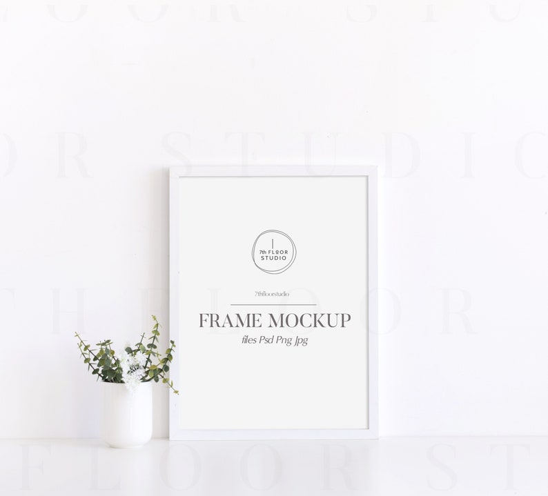 May include: White frame mockup with a white background. The frame is 8x10 inches and has a simple white mat. The text "FRAME MOCKUP" is printed in black below the frame. The text "files Psd Png Jpg" is printed in black below the text "FRAME MOCKUP".