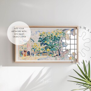 May include: A framed painting of a colorful landscape with a large tree in the center. The painting is in a wooden frame and is hanging on a white wall. The text "ADD YOUR ARTWORK WITH SMART OBJECT LAYER" is visible in a circle on the left side of the image.