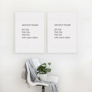 May include: Two white picture frames with black text that reads "MOCKUP FRAME" and lists "JPG File", "PNG File", "PSD File", and "with smart object". The frames are hanging on a white wall. A white chair with a gray and white blanket draped over it sits in front of the frames. A potted plant sits on the chair.