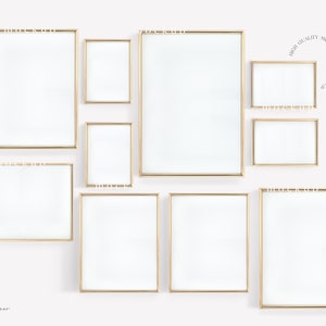 May include: A set of eight gold picture frames of various sizes, arranged on a white wall. The frames are all empty and have a simple, modern design.