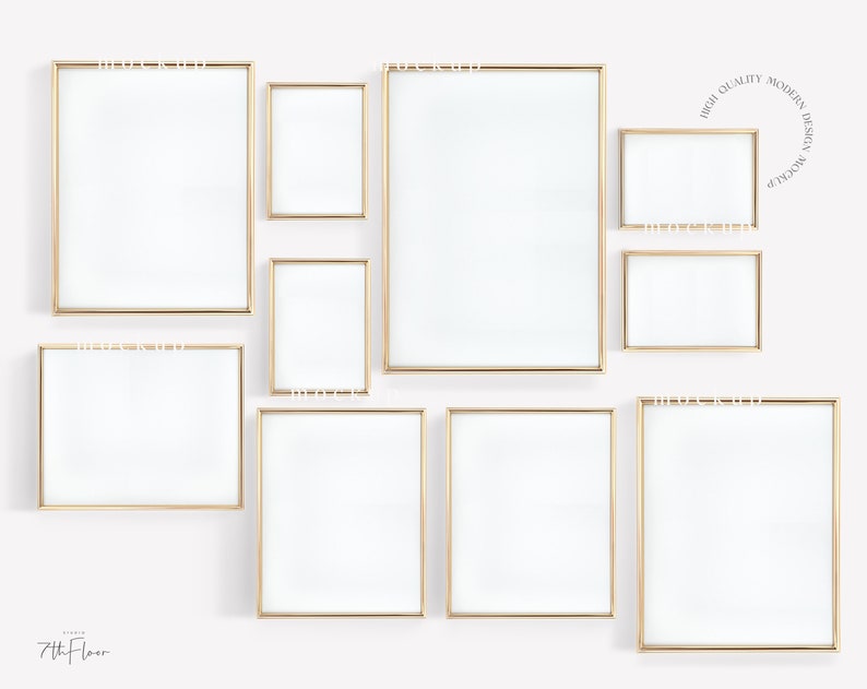 May include: A set of eight gold picture frames of various sizes, arranged on a white wall. The frames are all empty and have a simple, modern design.